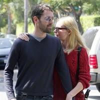 Kate Bosworth keeps close to her boyfriend as they leave Lemonade restaurant